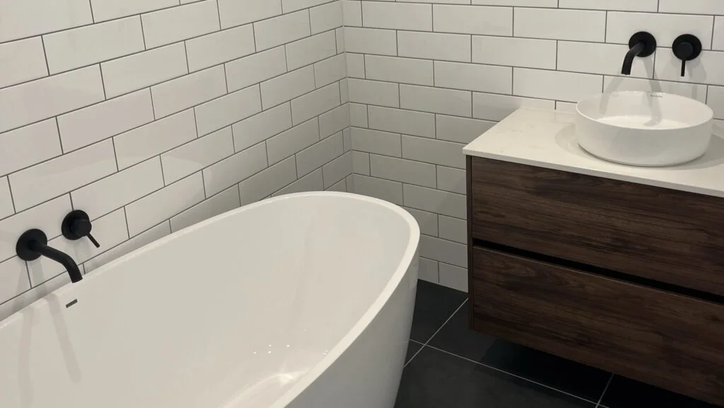 Black and white tiled bathroom